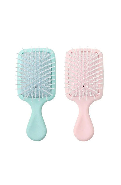 The Glow Beauty mini hair brush